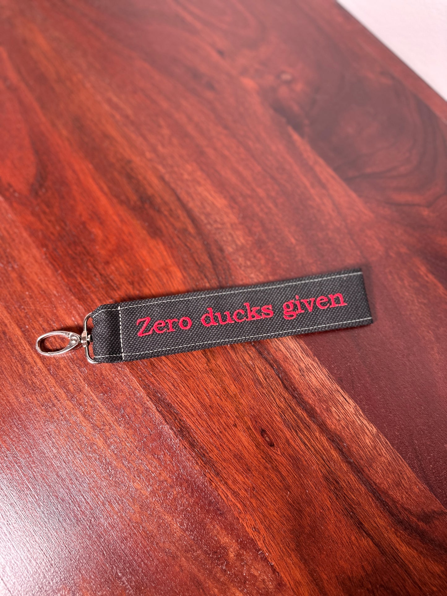 Handy-/Schlüsselhandschlaufe inkl. Handyhalterung - "Zero ducks given"