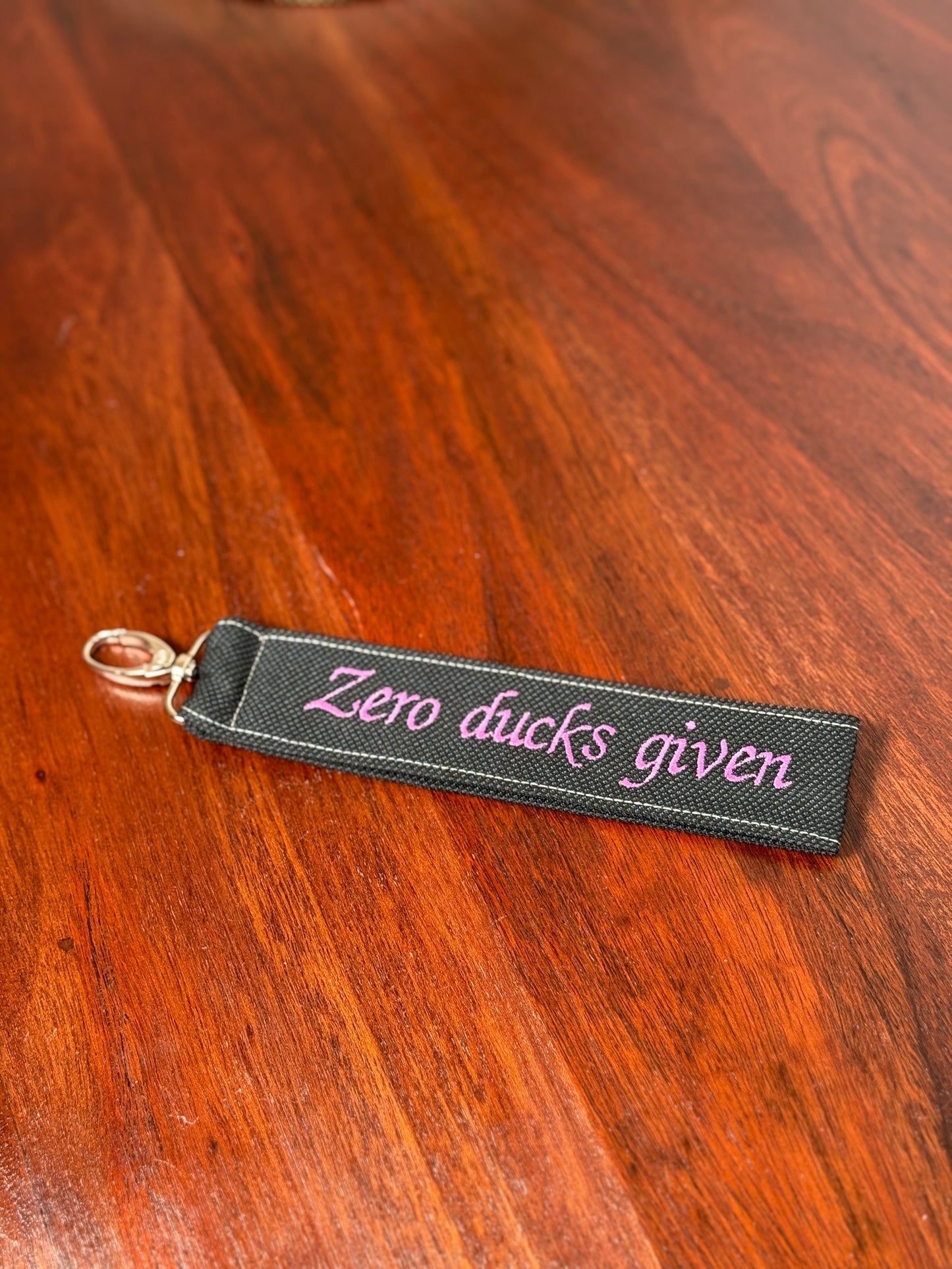 Handy-/Schlüsselhandschlaufe inkl. Handyhalterung - "Zero ducks given"
