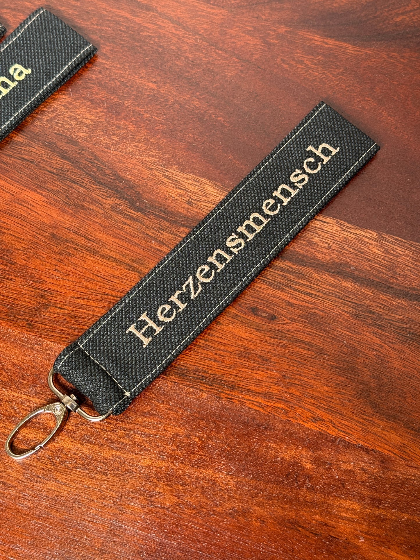 Vorführmodelle Handy-/Schlüsselhandschlaufe inkl. Handyhalterung