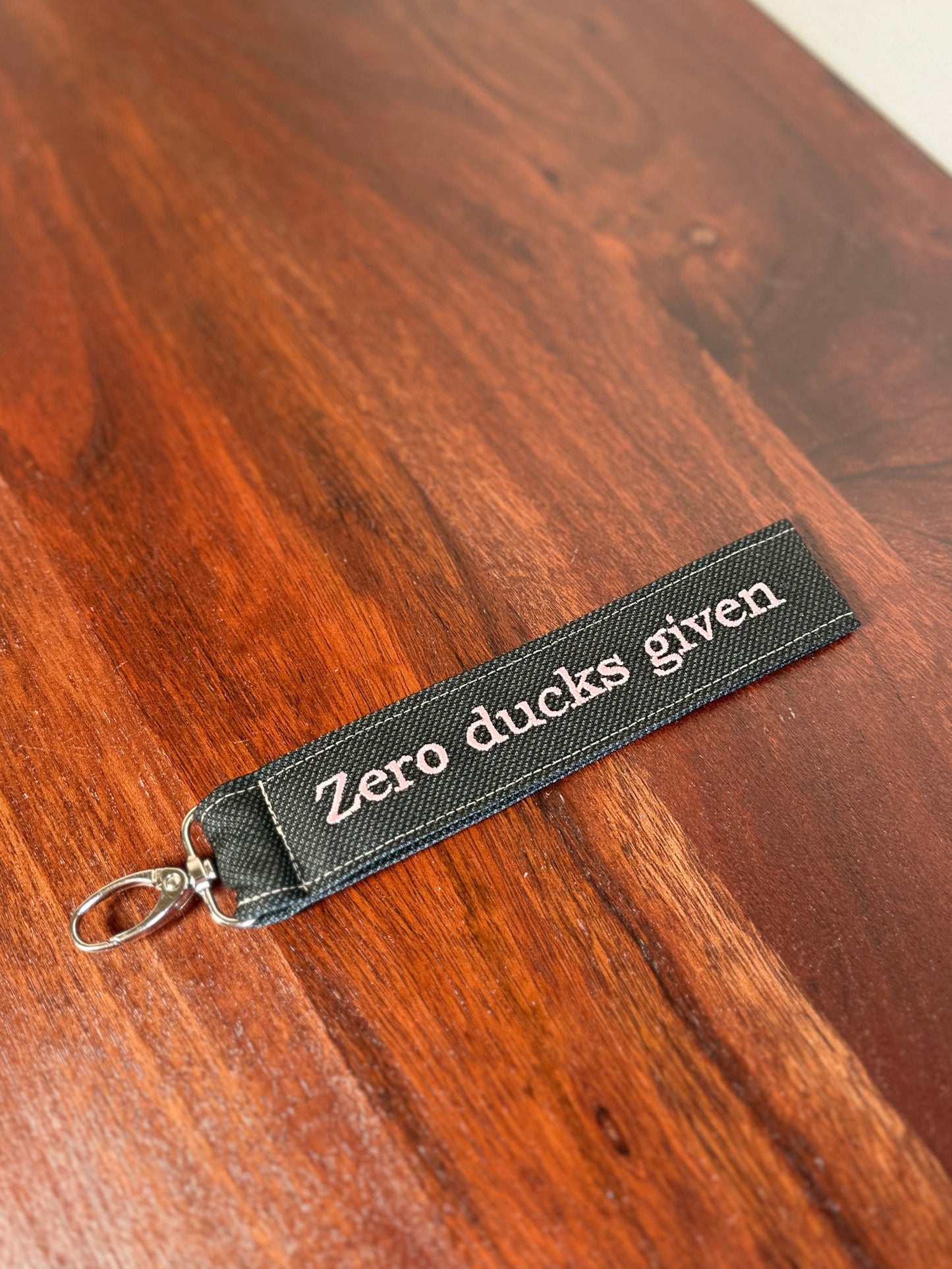Handy-/Schlüsselhandschlaufe inkl. Handyhalterung - "Zero ducks given"
