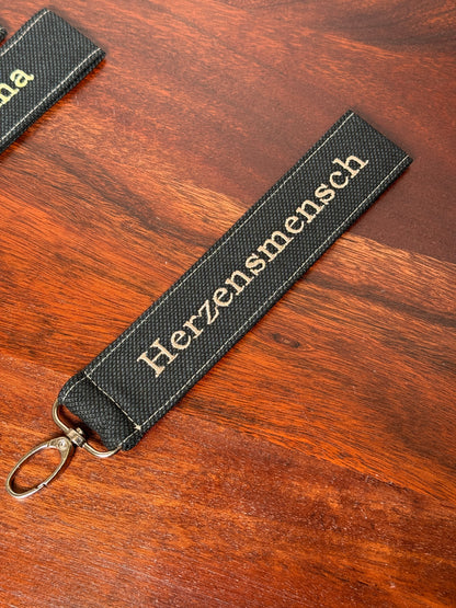 Vorführmodelle Handy-/Schlüsselhandschlaufe inkl. Handyhalterung