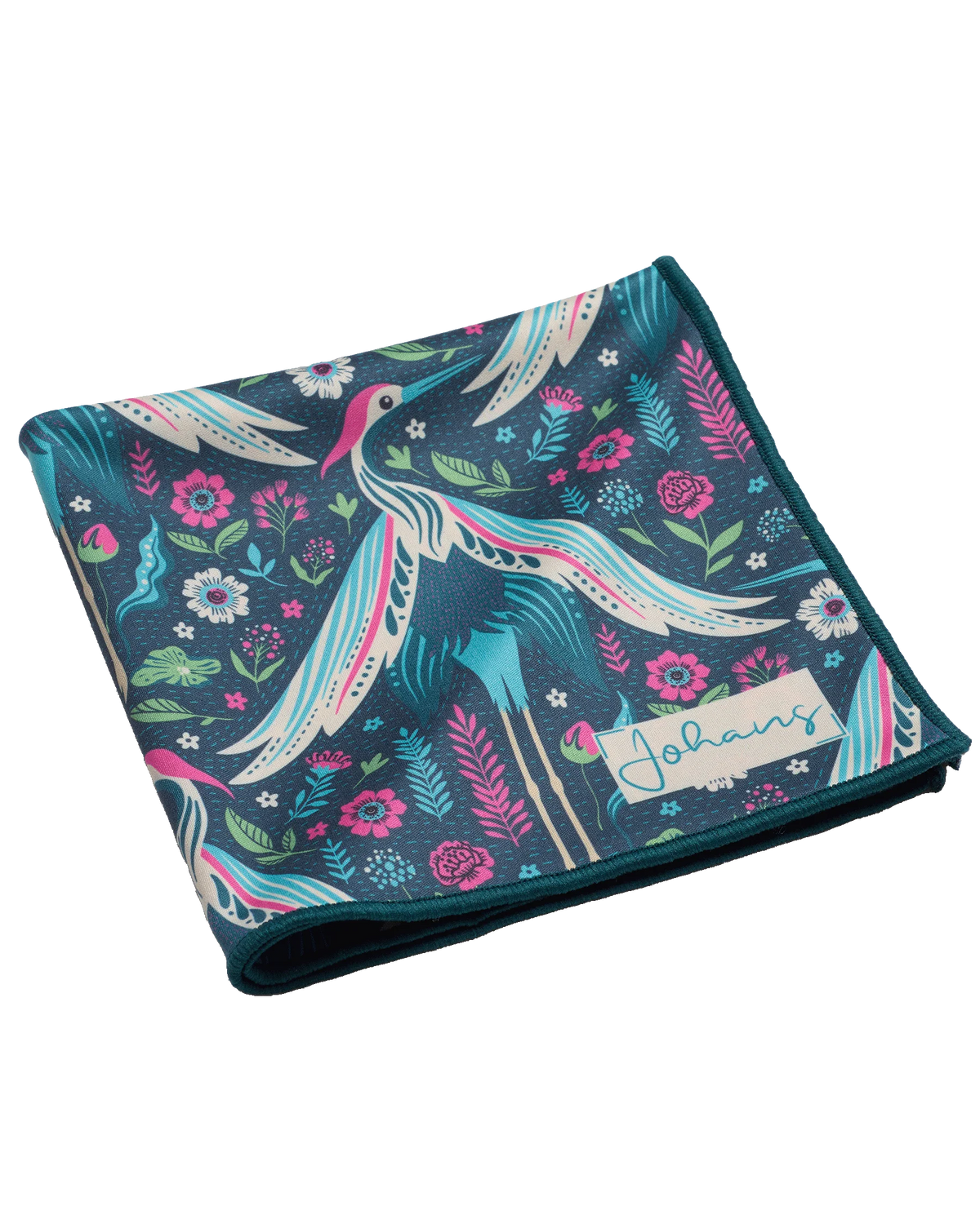 Johans® Mikrofasertuch Midnight Crane schräg gefaltet mit bunten Kranichen und Blüten